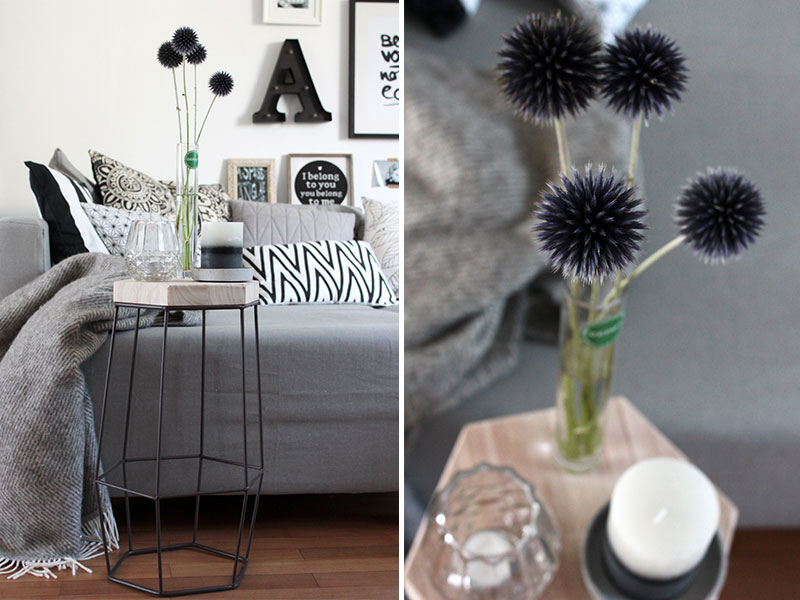 Beistelltisch-mit-Kerzen-und-Blumen-dekoriert