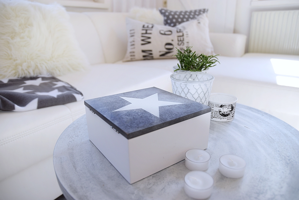 dekotrend-sterne-auf-kissen-plaids-und-co-12k