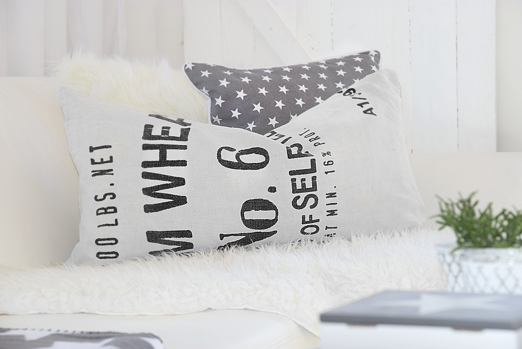 dekotrend-sterne-auf-kissen-plaids-und-co-5k