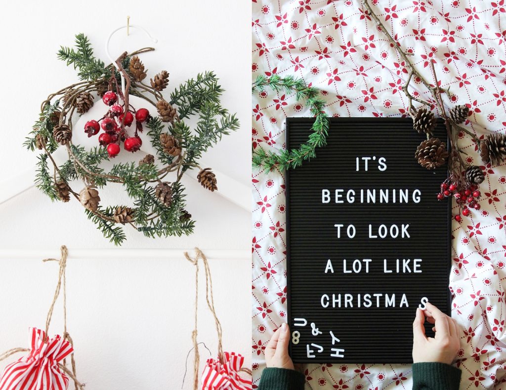 Eine Tannengirlande schmückt den Kleiderbügel, an welchem ihr die Stoffsäckchen befestigt und das Memoboard verbreitet zusätzliche Weihnachtsbotschaften.