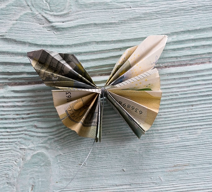 Geldscheine zu Schmetterling falten