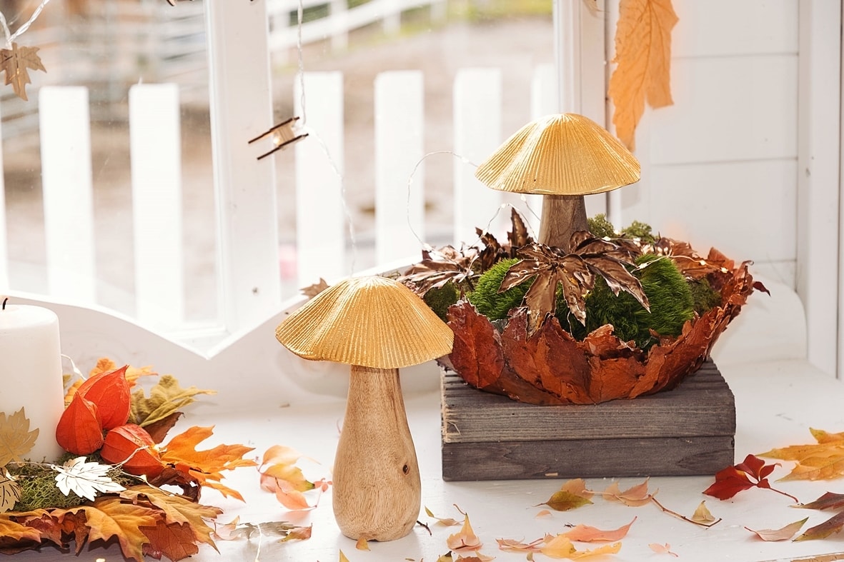 Herbstdeko mit goldenen Akzente.