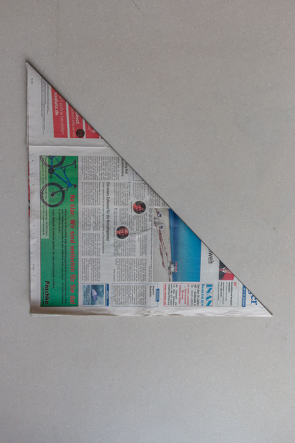 4. Schritt Mülltüten aus Zeitungspapier falten